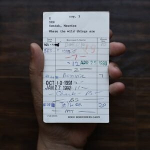 person holding white paper document